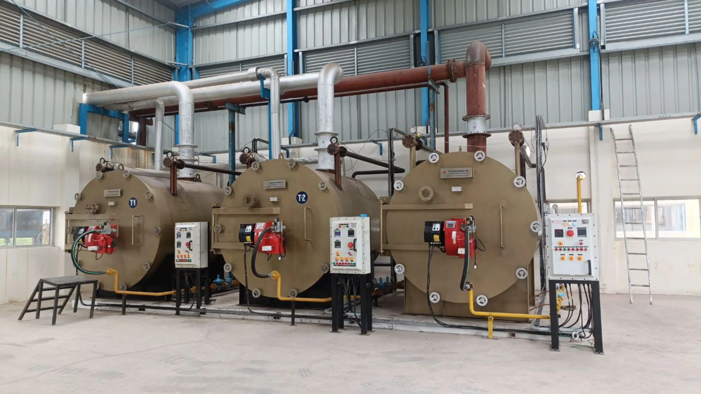 High efficiency thermic fluid heater for industrial process heating applications